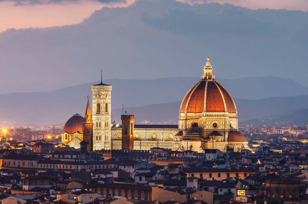 Beautiful view of illuminated Florence in sunset. Travel background